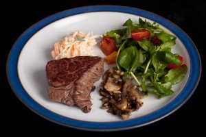 Rump Steak (100g) with garlic mushrooms, coleslaw and watercress salad